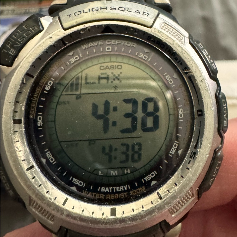 Casio Black and Silver Smartwatch with Digital Display